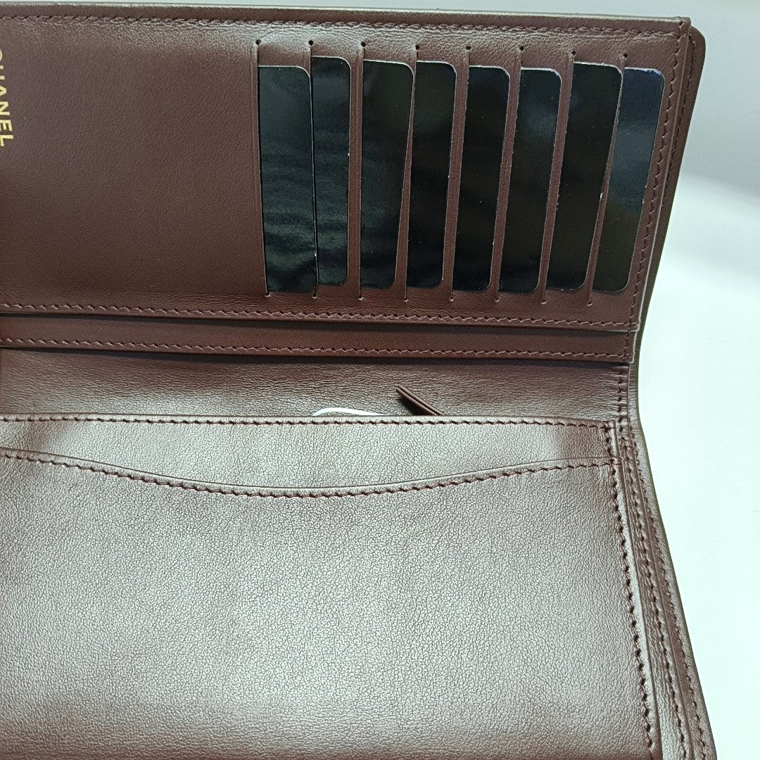 Authenticated pre-owned  Classic Flap Quilted Grained Calfskin Black Wallet - Wallet at Looply