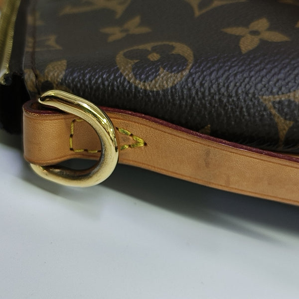 TURENNE PM Monogram Coated Canvas Brown