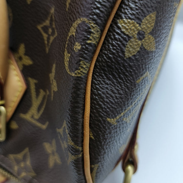 SPEEDY 25 Monogram Coated Canvas Brown