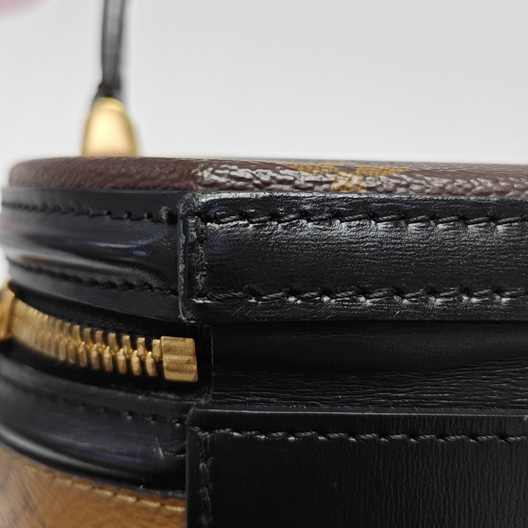CANNES PM Monogram Coated Canvas Brown