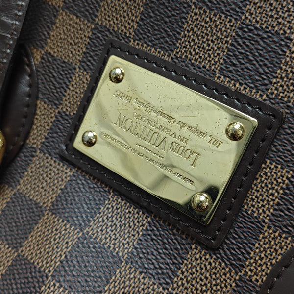 HAMPSTEAD PM Damier Ebene Coated Canvas Brown