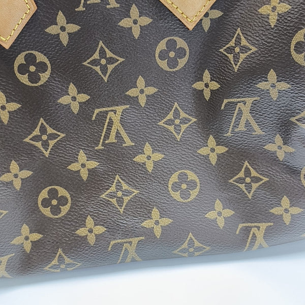 SPEEDY 25 Monogram Coated Canvas Brown