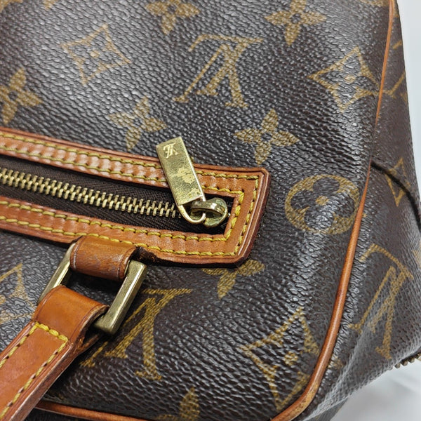 CITE Monogram Coated Canvas Brown