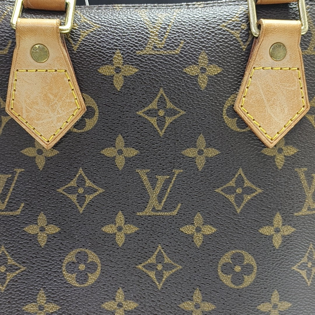 ALMA PM Monogram Coated Canvas Brown