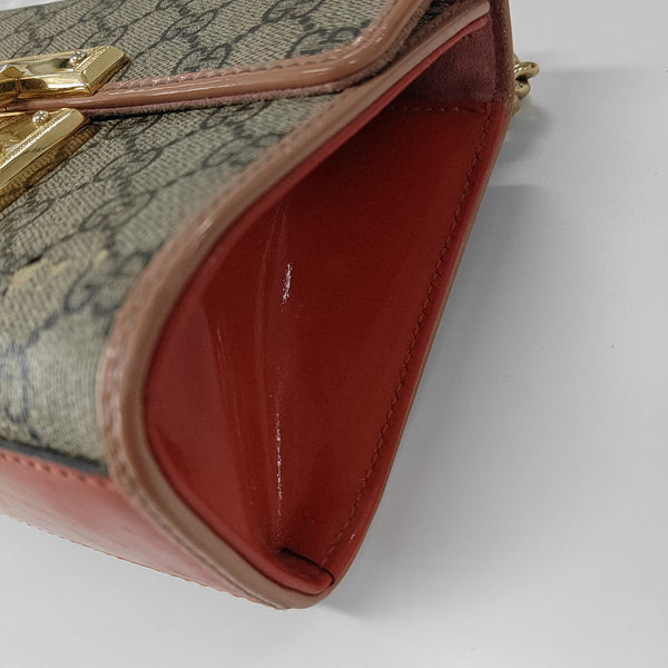 Candado pequeño Monogram lona revestida beige