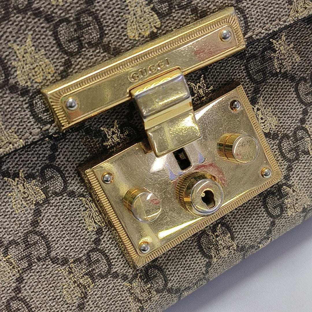 Padlock Small Monogram Coated Canvas Beige