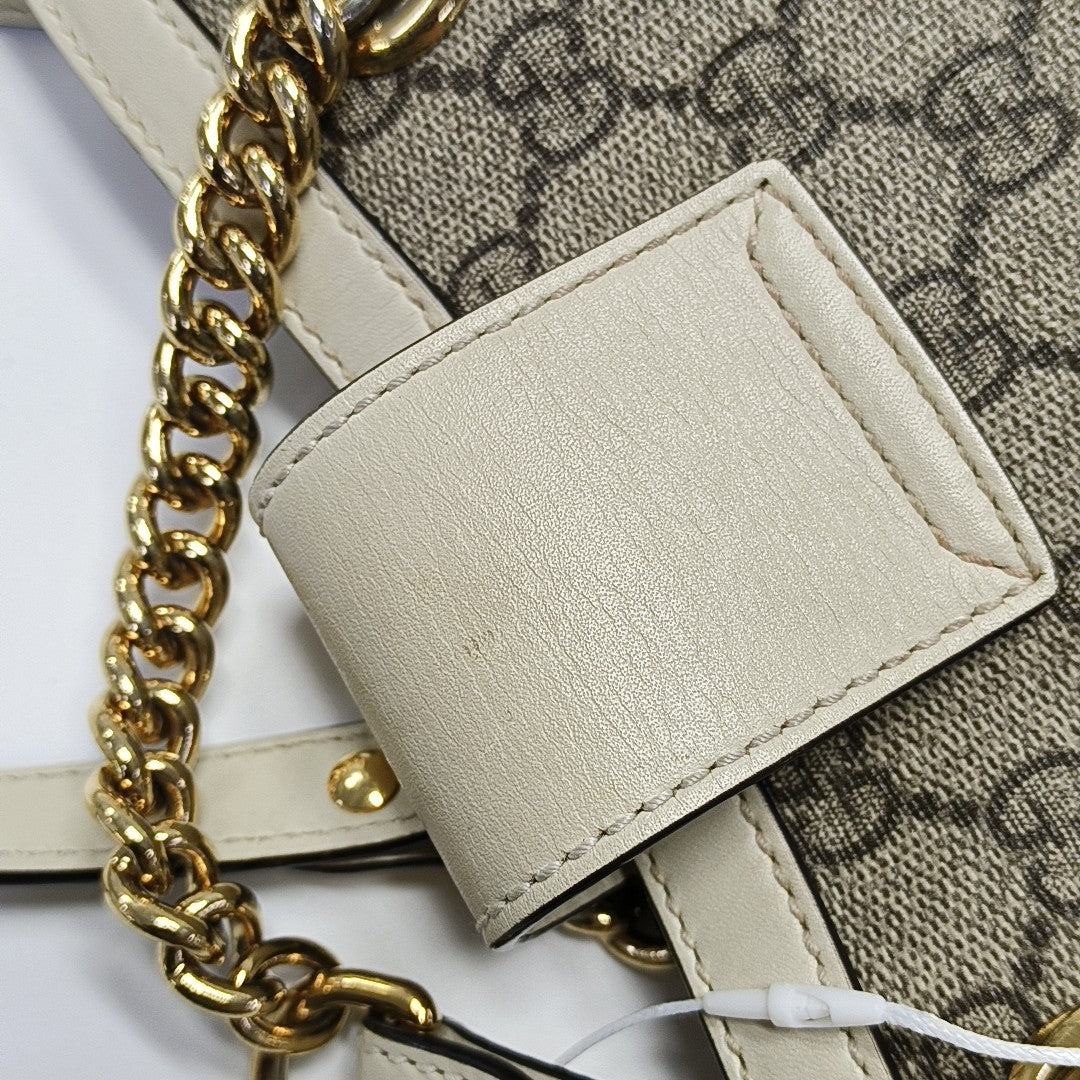 Padlock Small Monogram Coated Canvas Beige