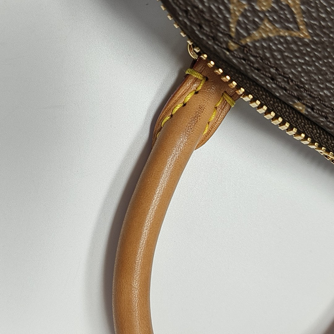 ALMA Mini Monogram Coated Canvas Brown