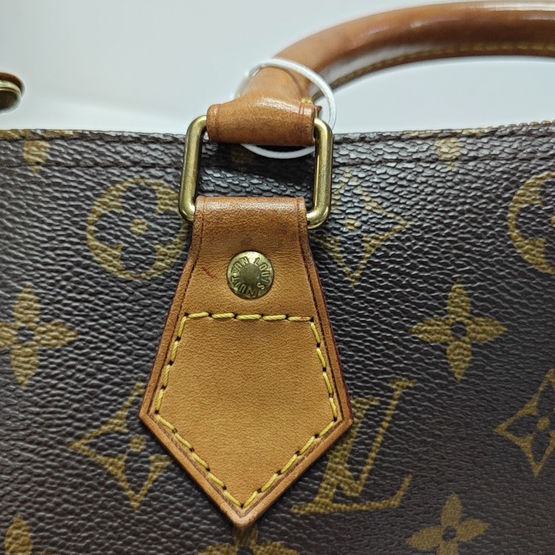 SPEEDY 30 Monogram Coated Canvas Brown