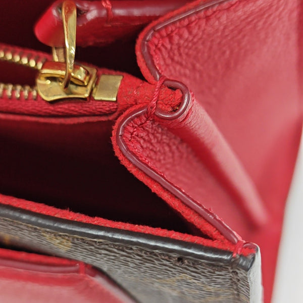 VICTOIRE Monogram Coated Canvas Brown