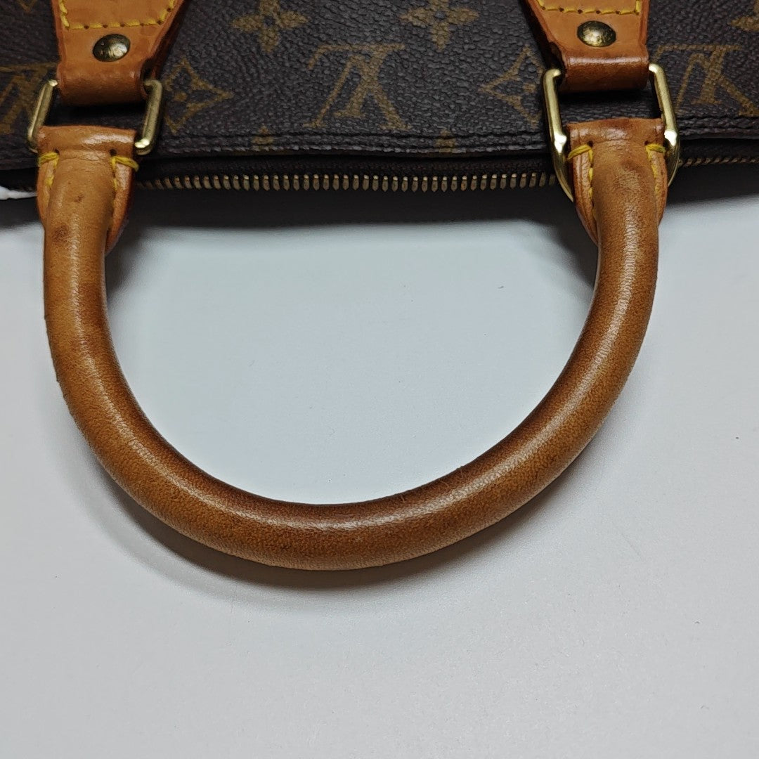 ALMA PM Monogram Coated Canvas Brown