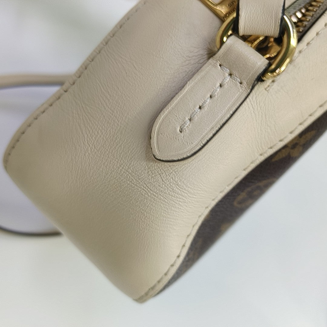 SAINTONGE Monogram Coated Canvas Brown