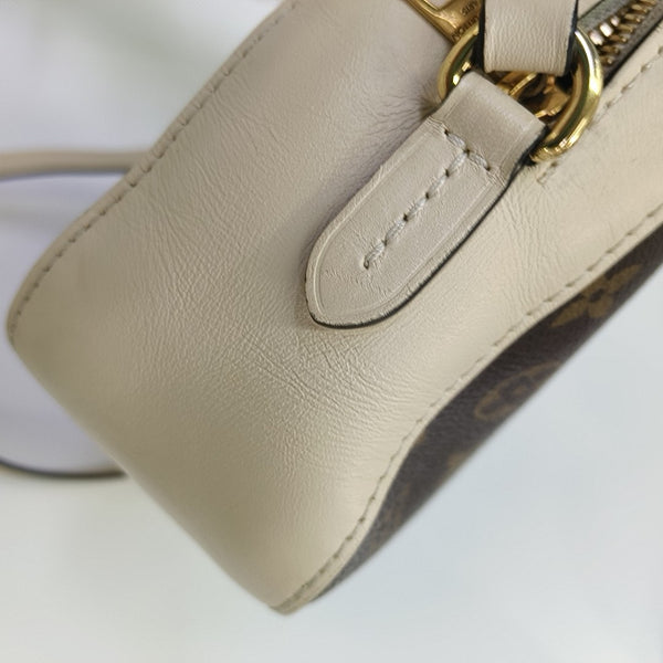 SAINTONGE Monogram Coated Canvas Brown
