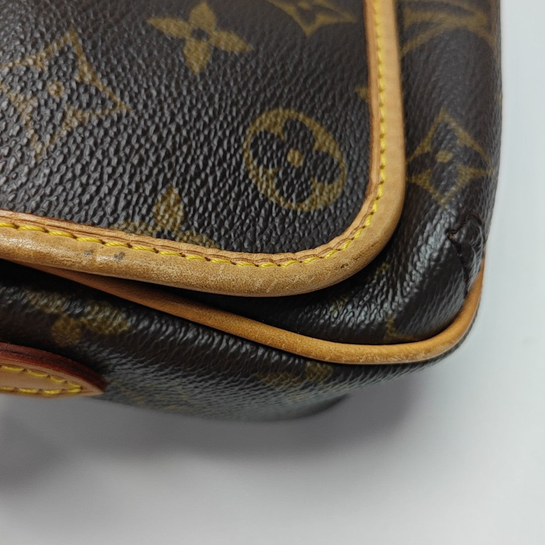 TIKAL Monogram Coated Canvas Brown