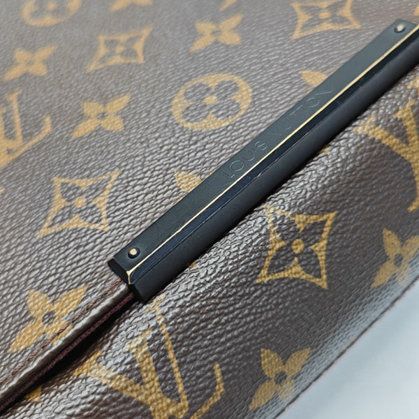DISTRICT MM Monogram Coated Canvas Brown