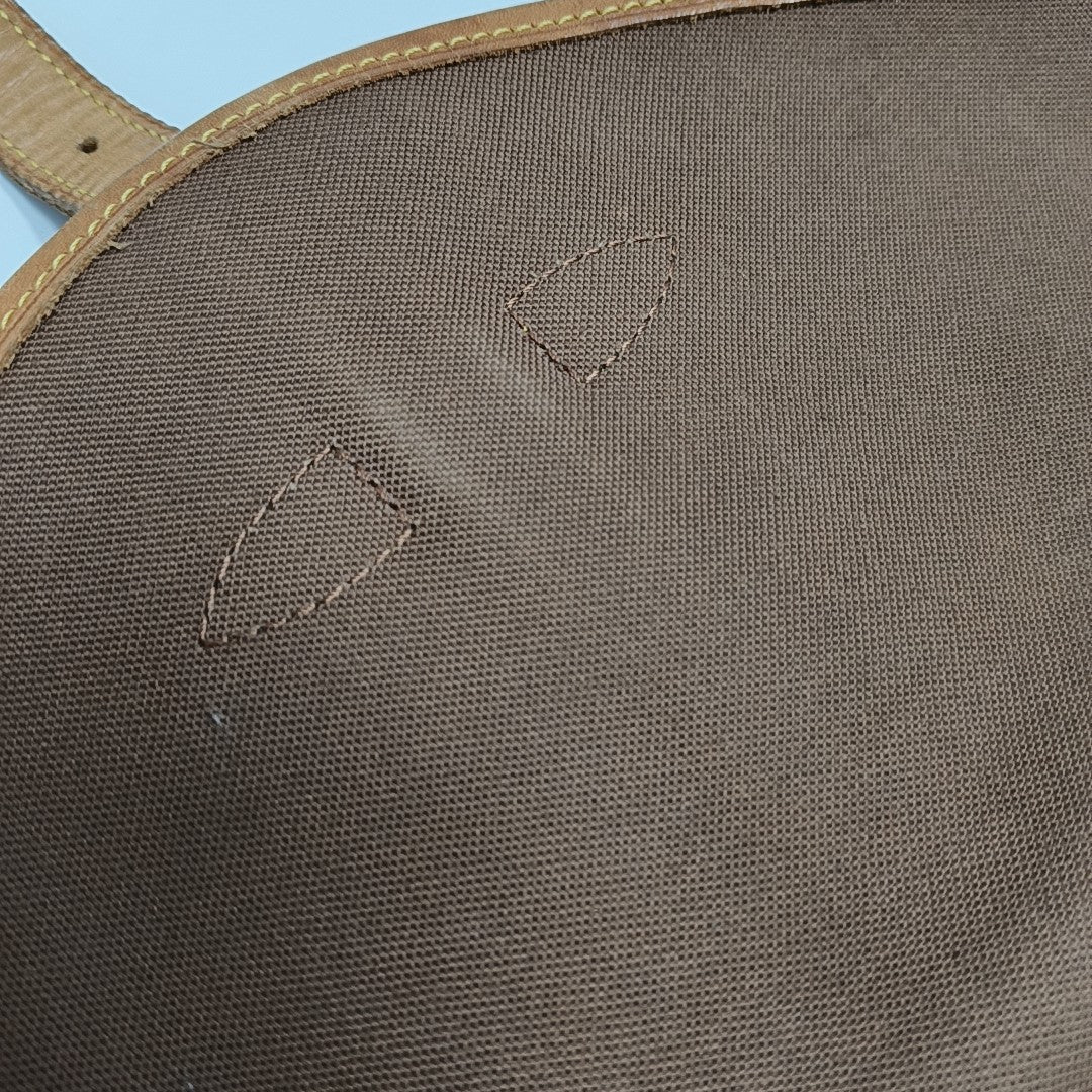 SAUMUR Monogram Coated Canvas Brown