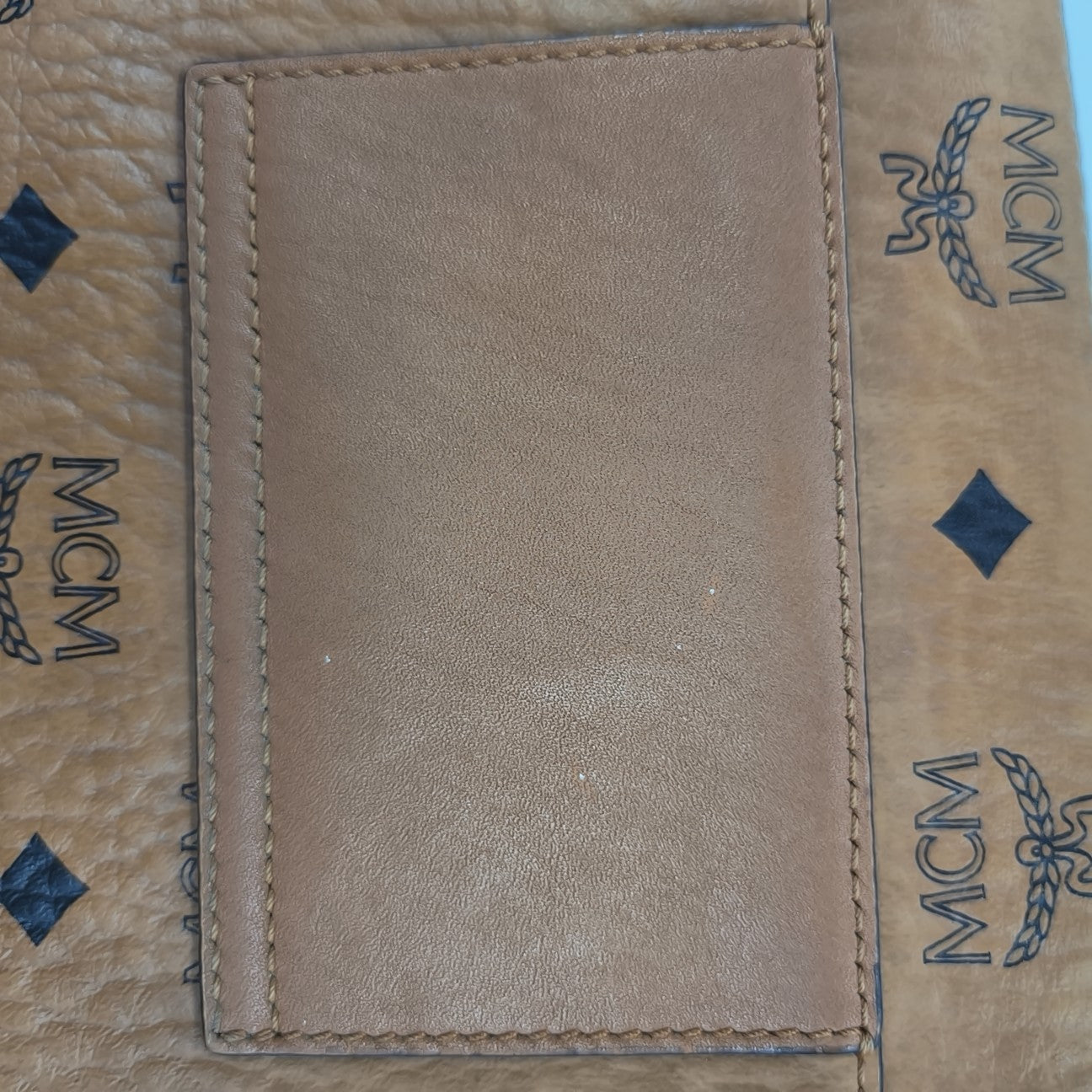 Viktor Visetos Small Monogram Coated Canvas Brown