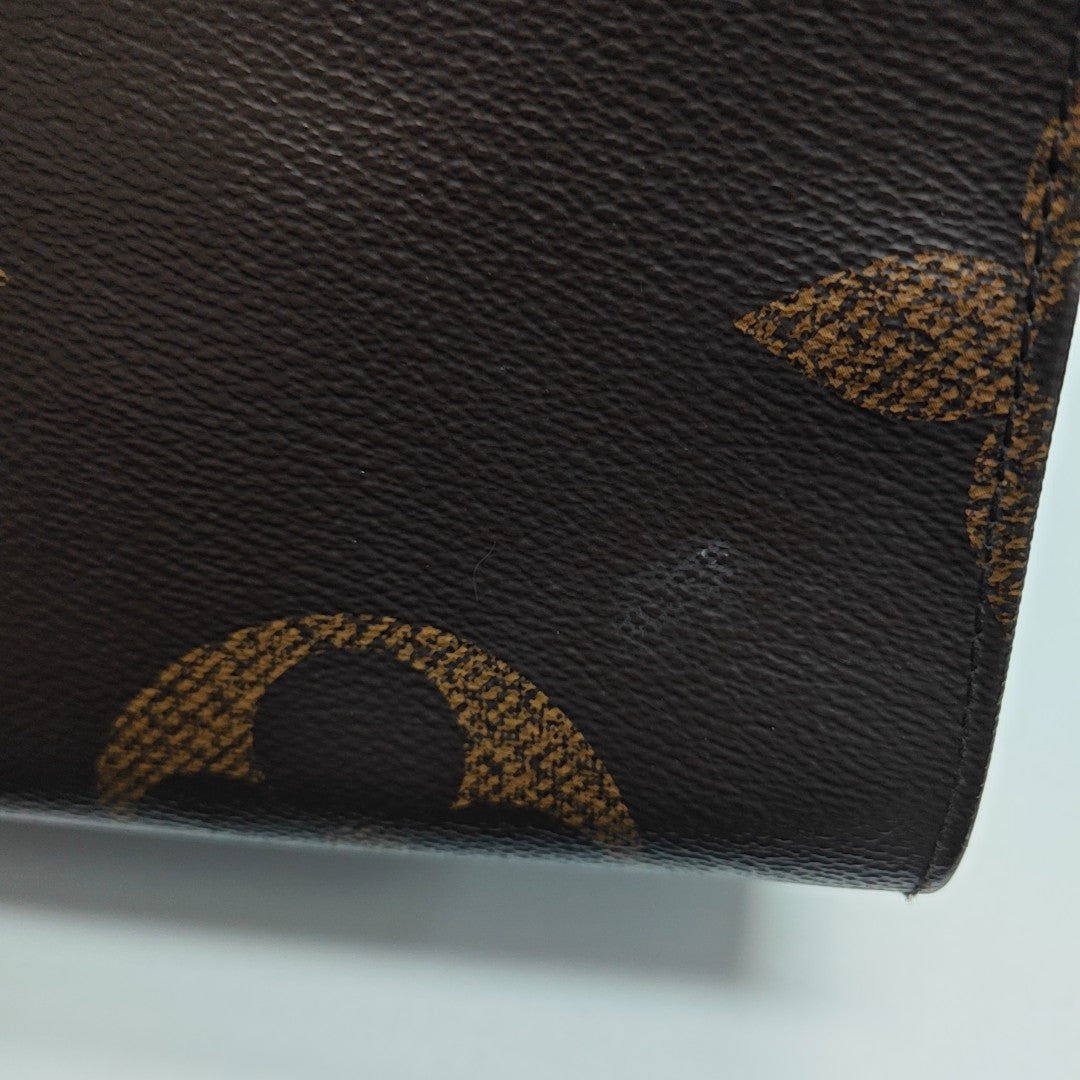 ONTHEGO GM Monogram Coated Canvas Brown