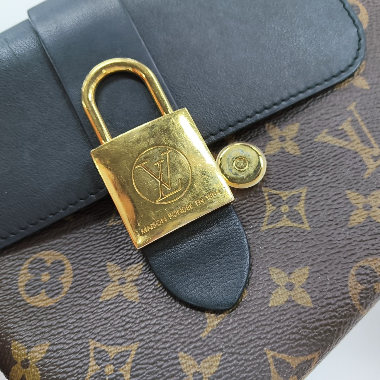 LOCKY BB Monogram Coated Canvas Brown