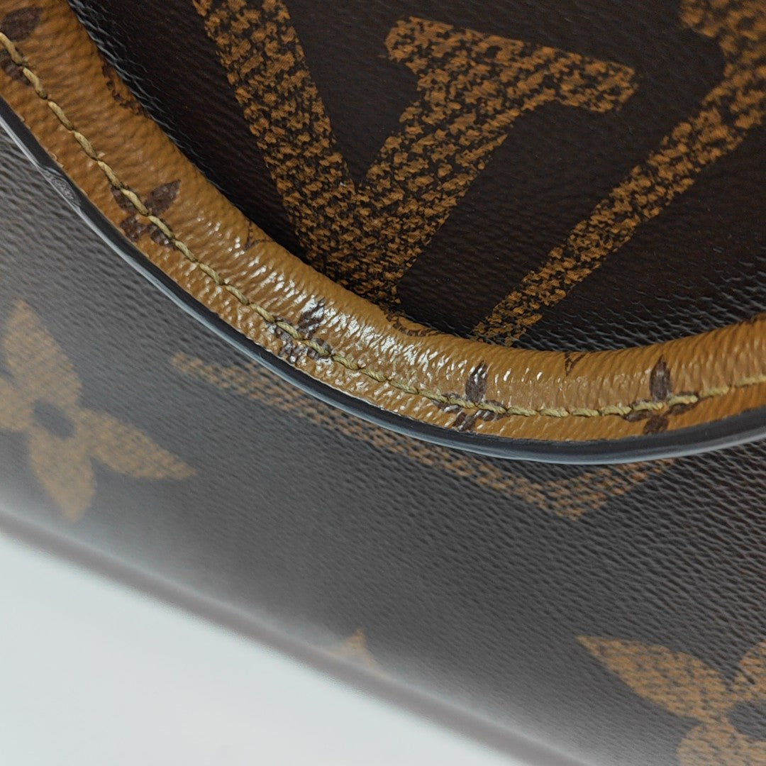 ONTHEGO MM Monogram Coated Canvas Brown