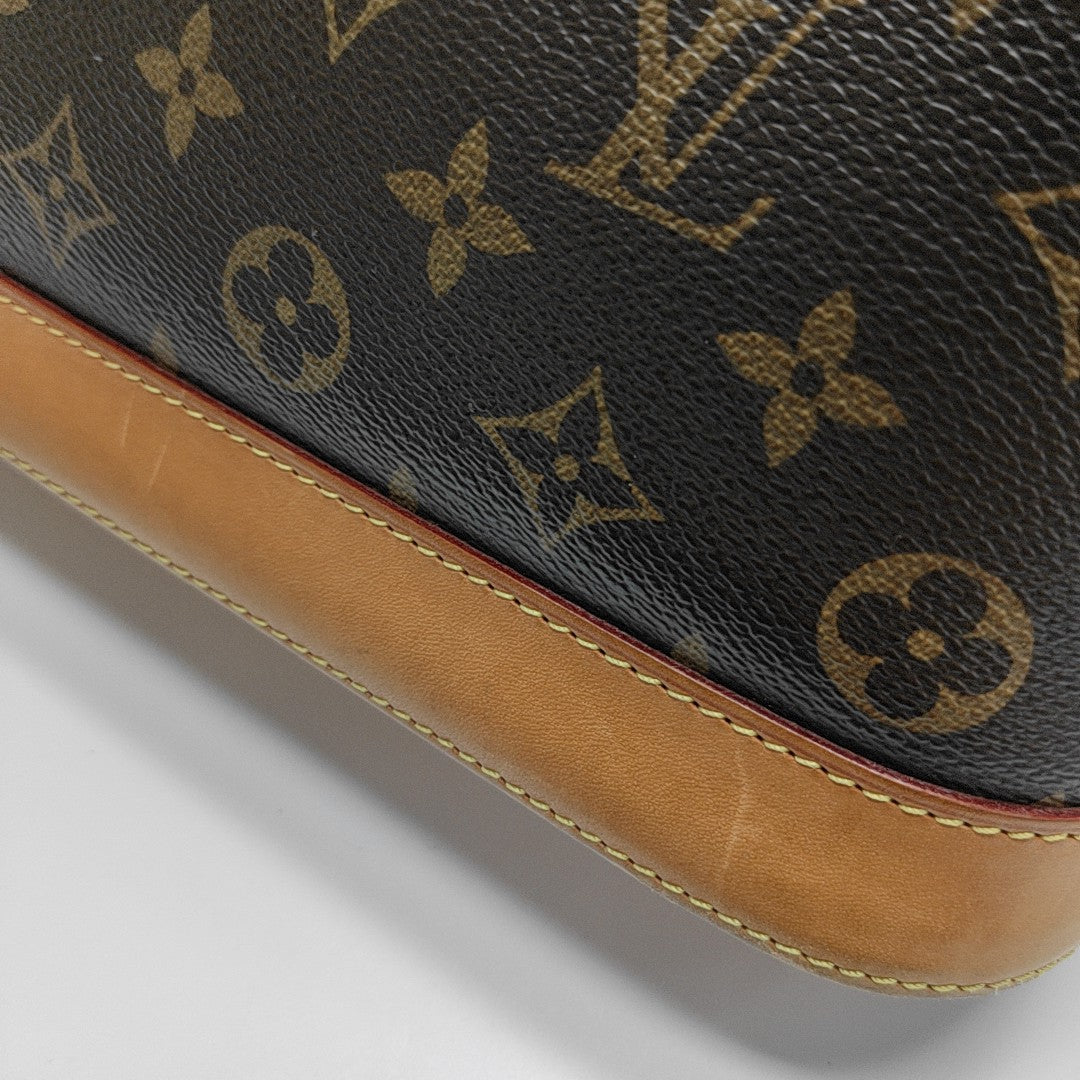 ALMA PM Monogram Coated Canvas Brown