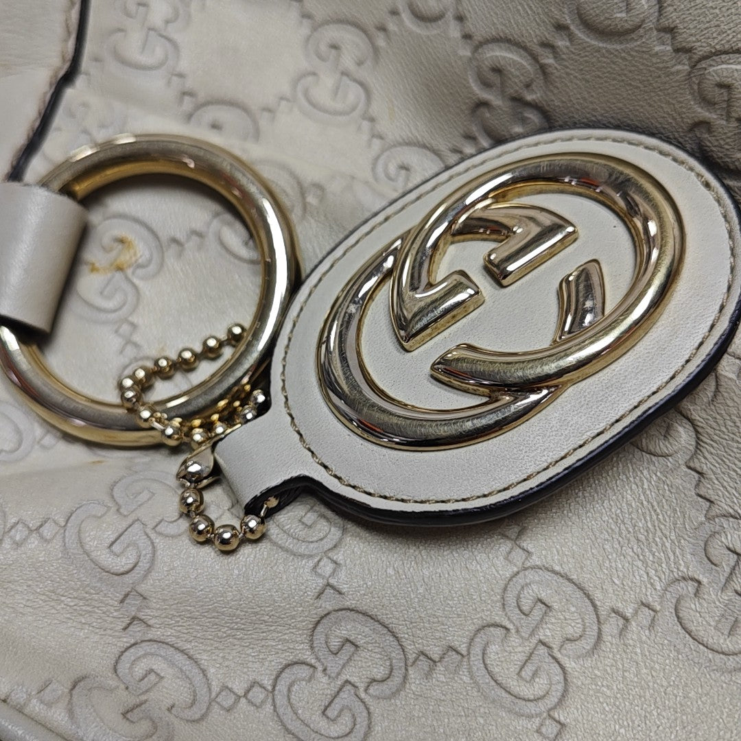 Sukey Monogram Calfskin Beige