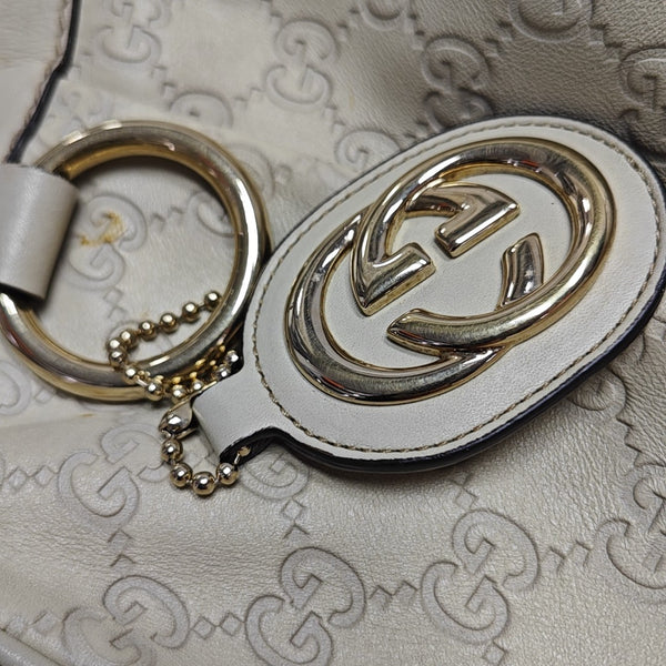 Sukey Monogram Calfskin Beige