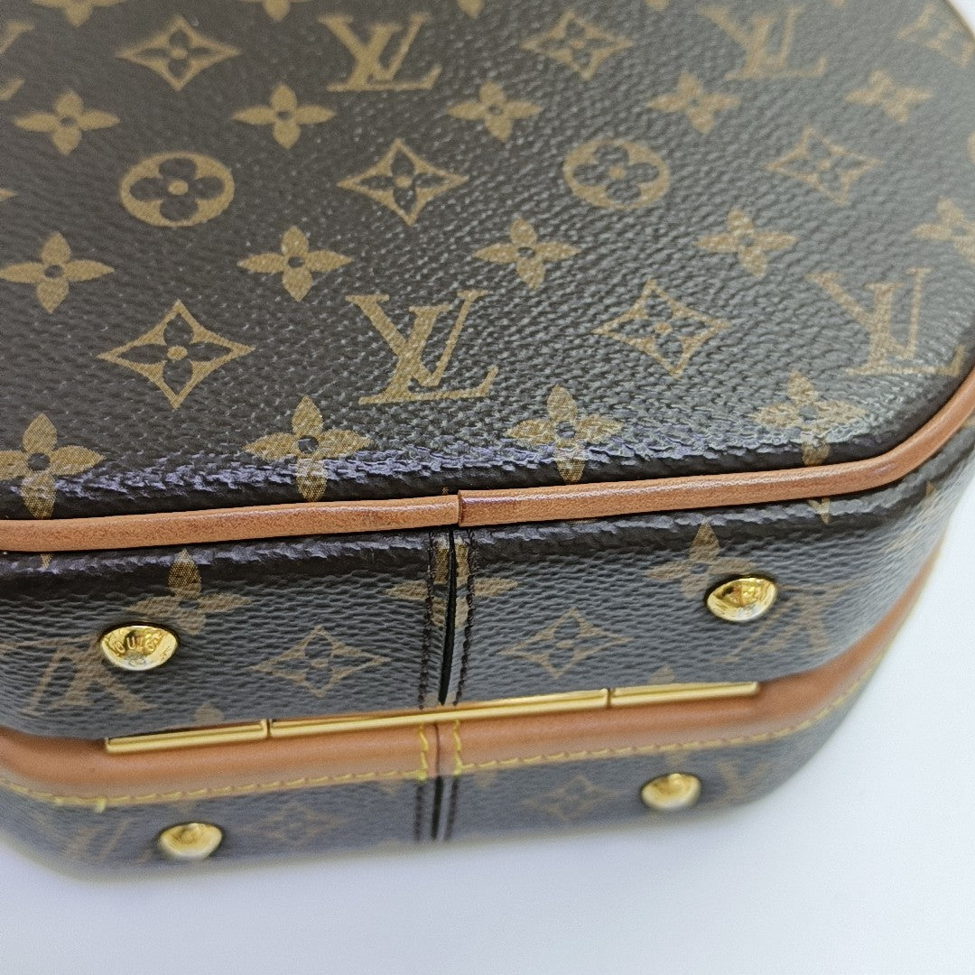 BOITE CHAPEAU PM Monogram Coated Canvas Brown