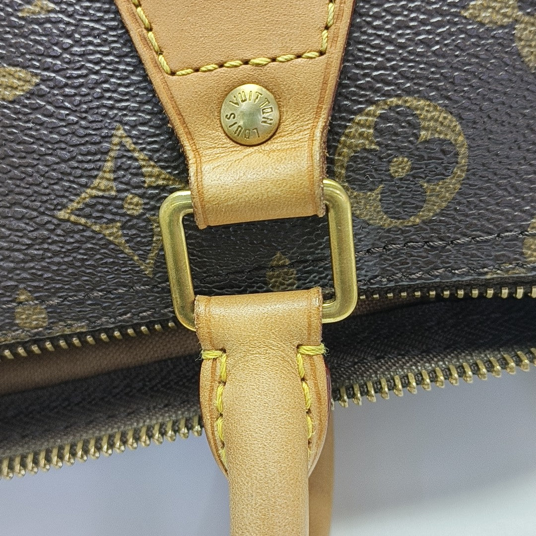 SPEEDY 30 Monogram Coated Canvas Brown