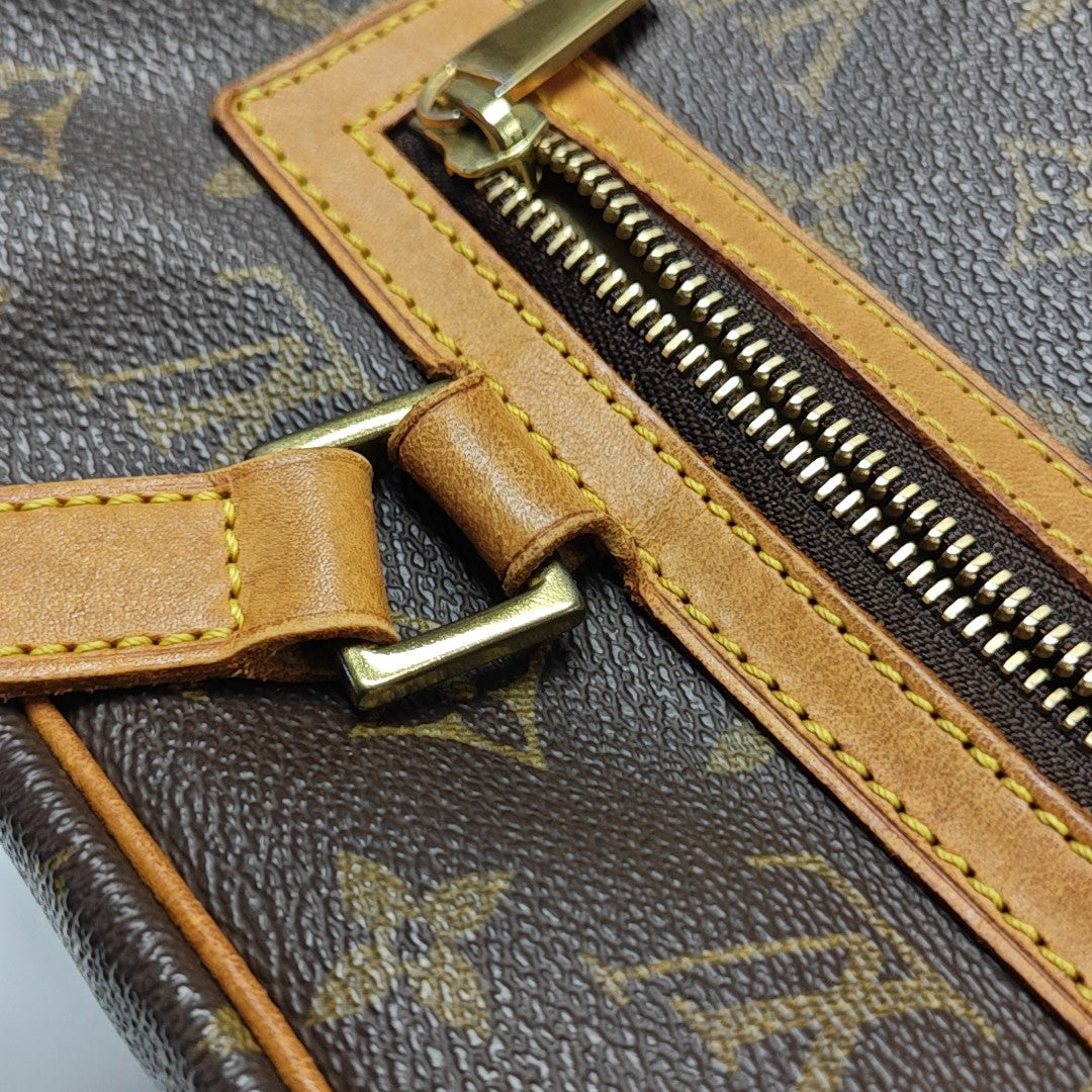 CITE GM Monogram Coated Canvas Brown