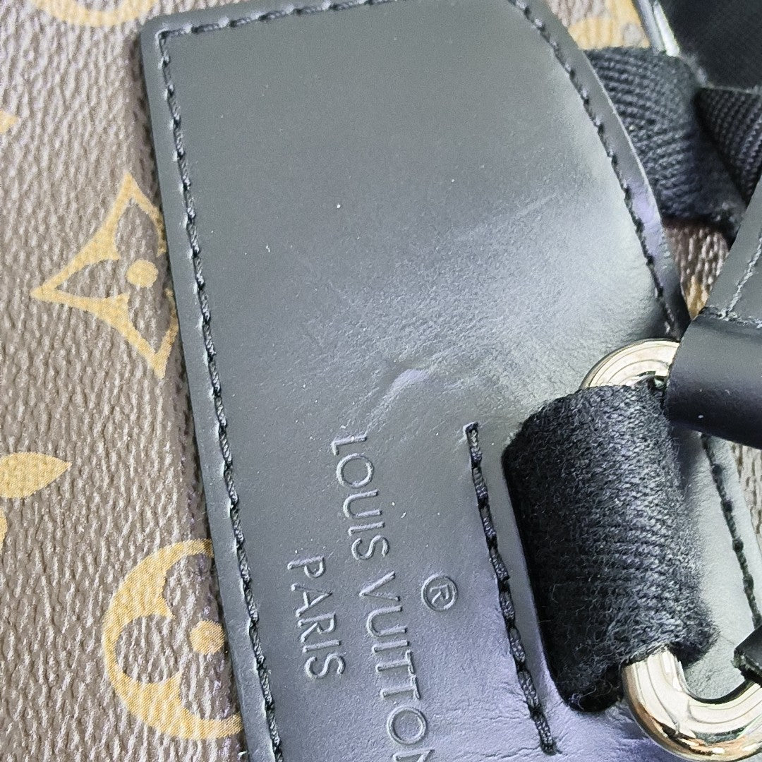 JOSH Monogram Coated Canvas Brown