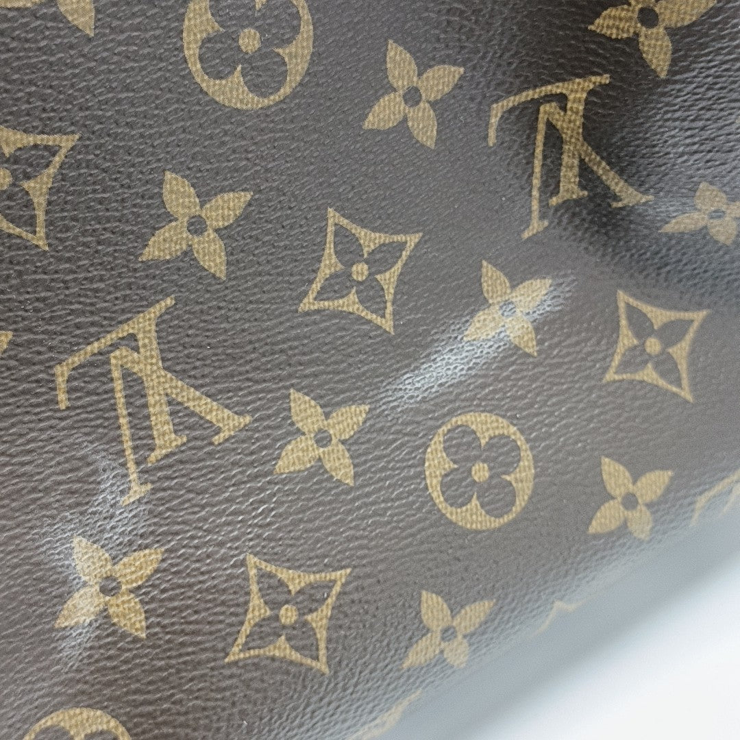 SPEEDY 25 Monogram Coated Canvas Brown