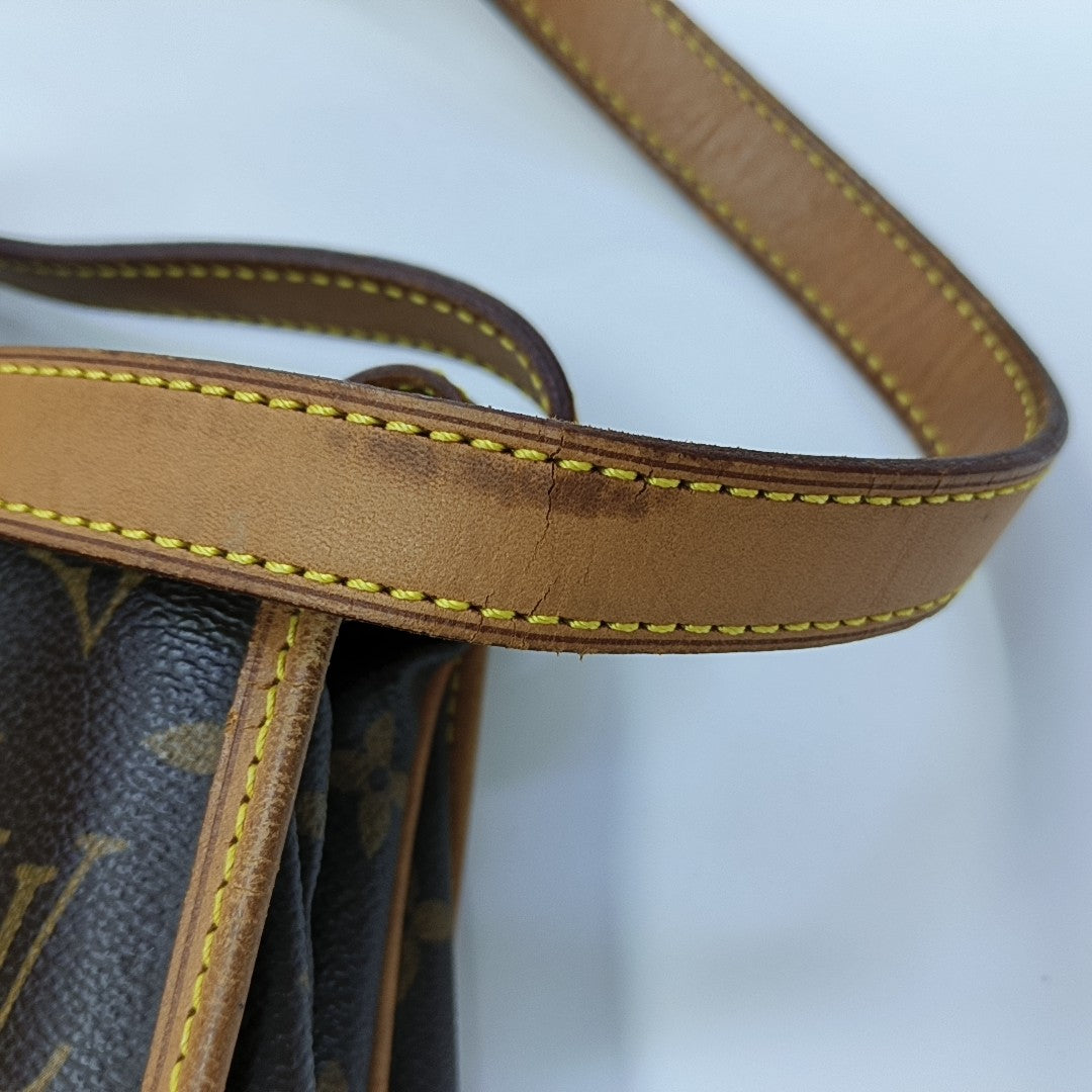 SAUMUR 30 Monogram Coated Canvas Brown