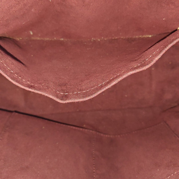 MELIE Monogram Coated Canvas Brown