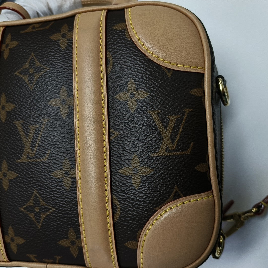 LUGGAGE Monogram Coated Canvas Brown
