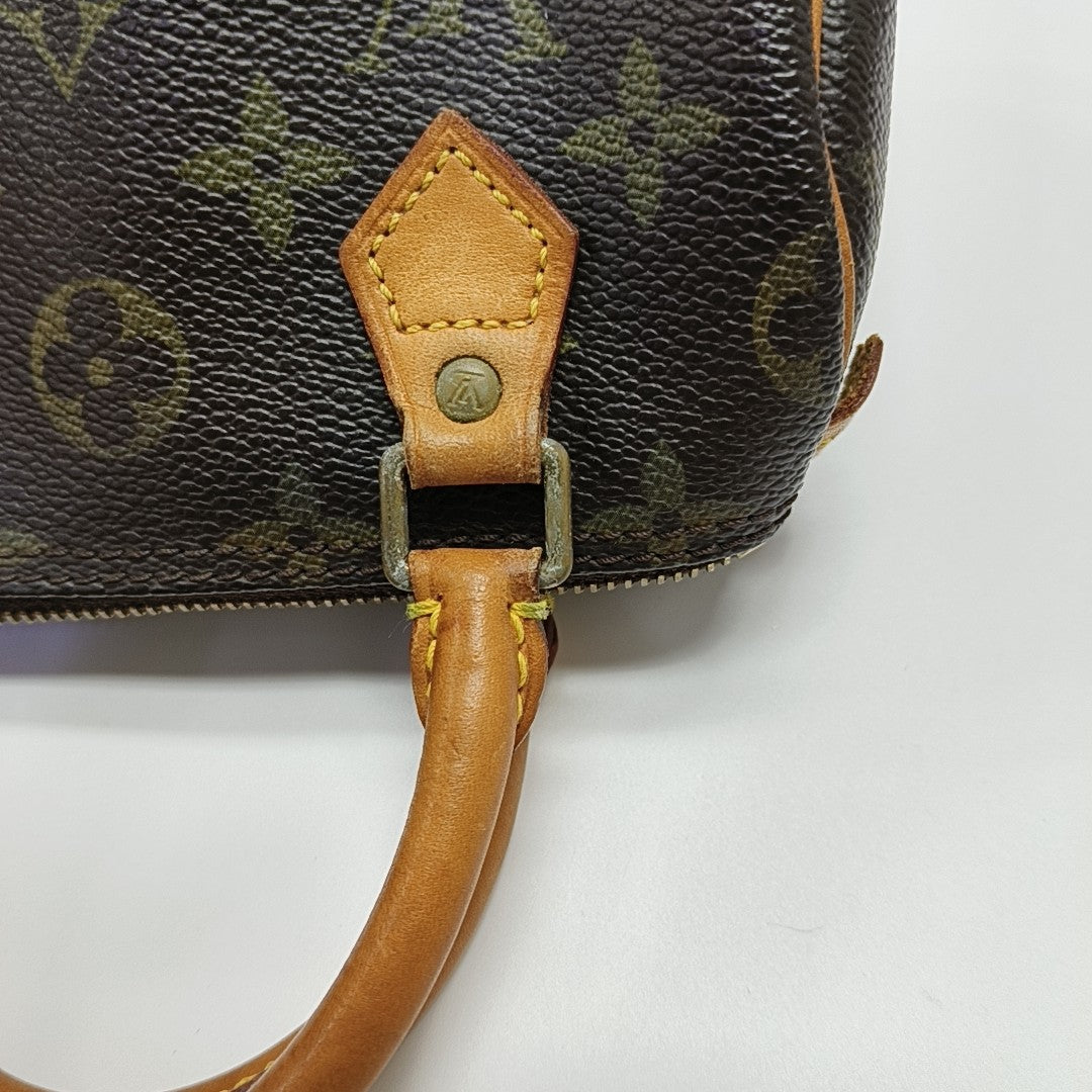 SPEEDY Monogram Coated Canvas Brown