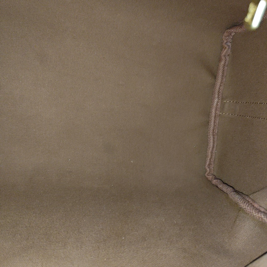 SPEEDY 30 Monogram Coated Canvas Brown
