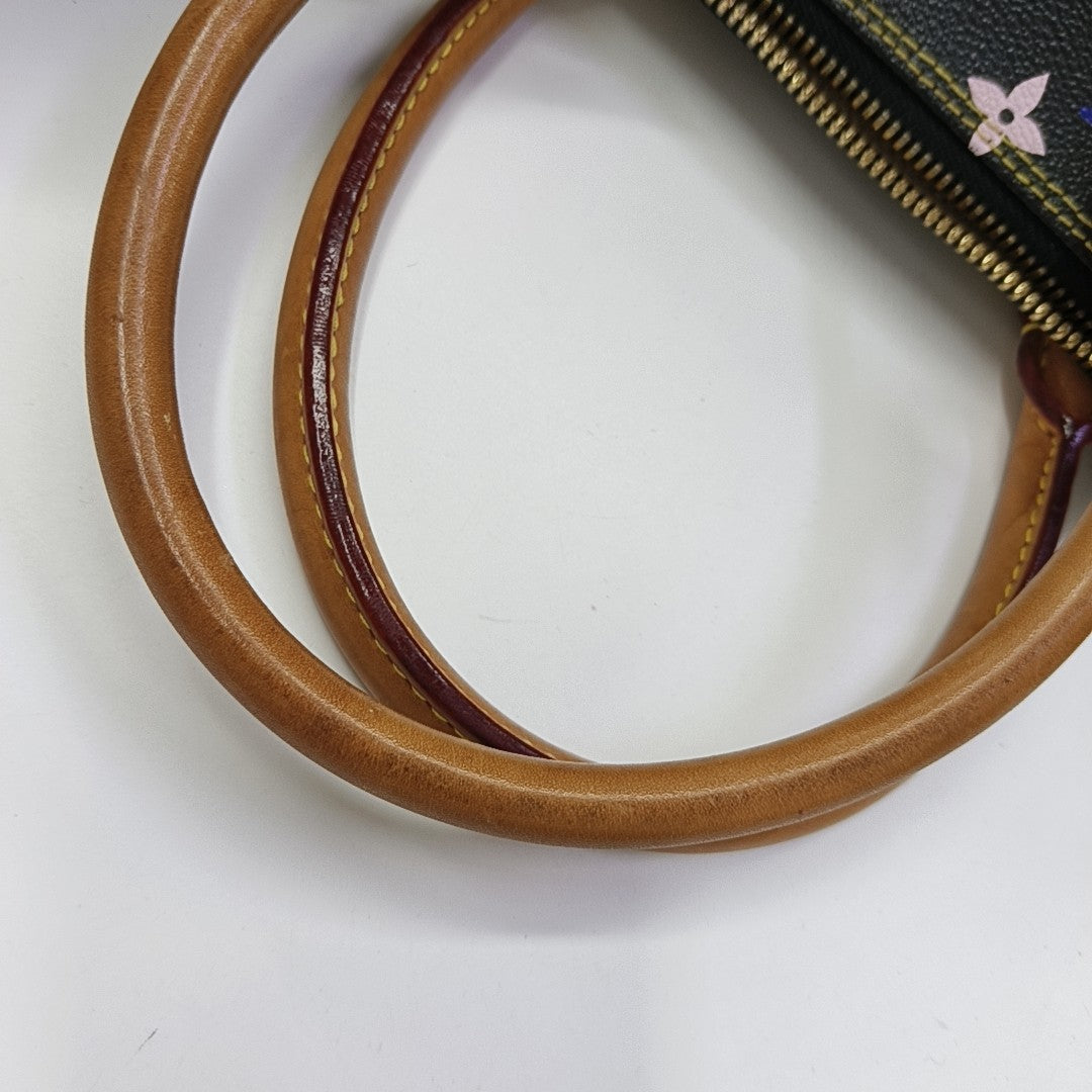 LV × TM RITA Monogram Coated Canvas Black