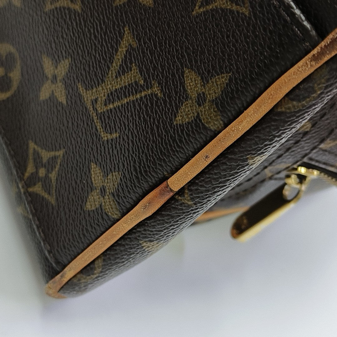 MANHATTAN GM Monogram Coated Canvas Brown