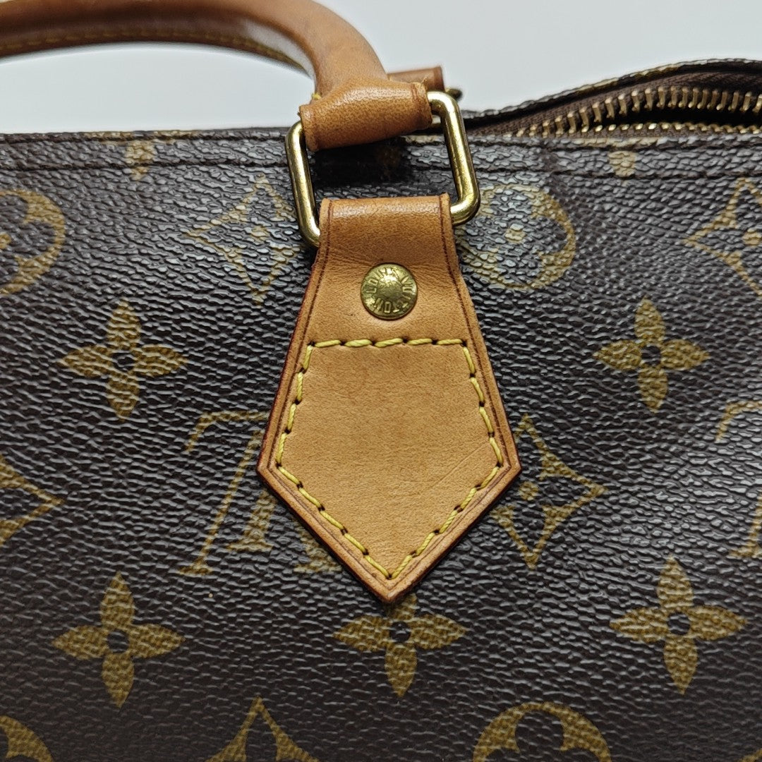 SPEEDY 30 Monogram Coated Canvas Brown