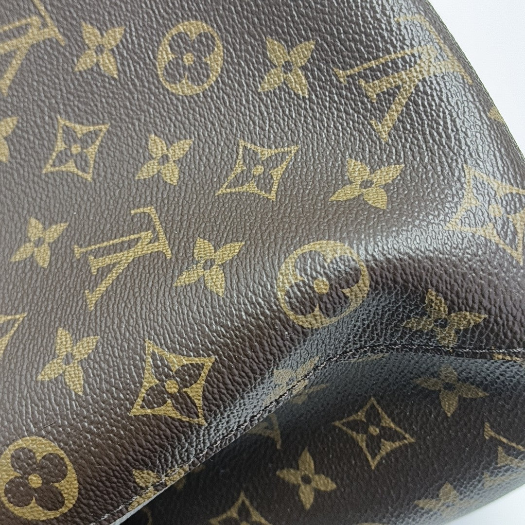 MONTAIGNE Monogram Coated Canvas Brown