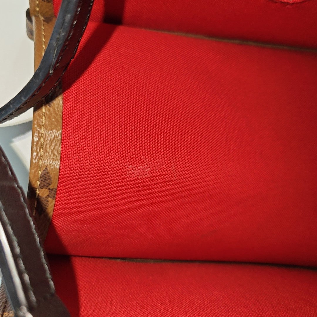ONTHEGO MM Monogram Coated Canvas Brown