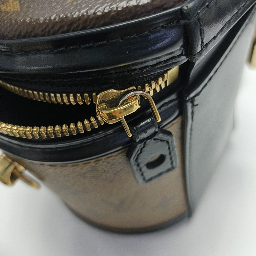 CANNES PM Monogram Coated Canvas Brown
