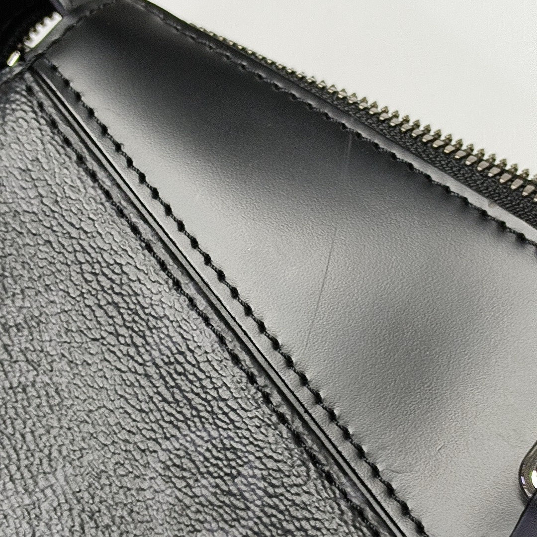 EXPLORER Monogram Coated Canvas Black