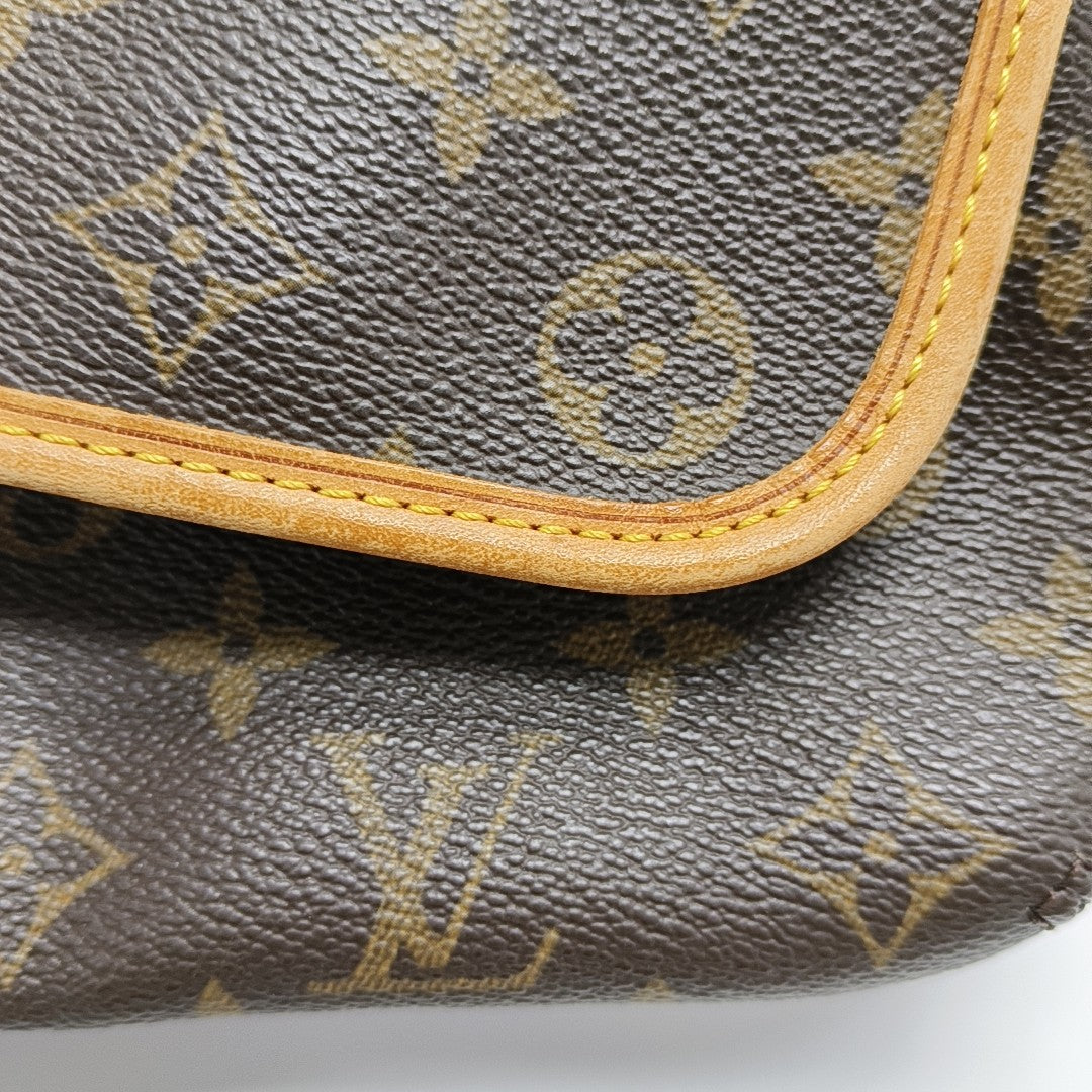 TIKAL Monogram Coated Canvas Brown