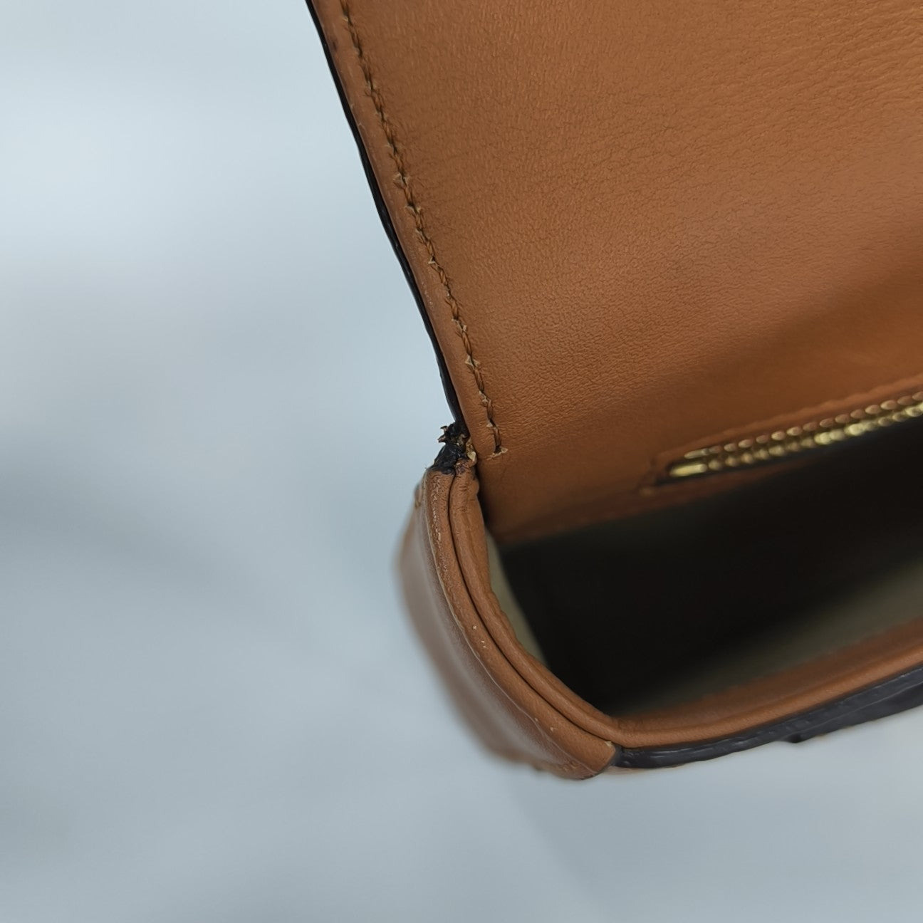 Viktor Visetos Small Monogram Coated Canvas Brown