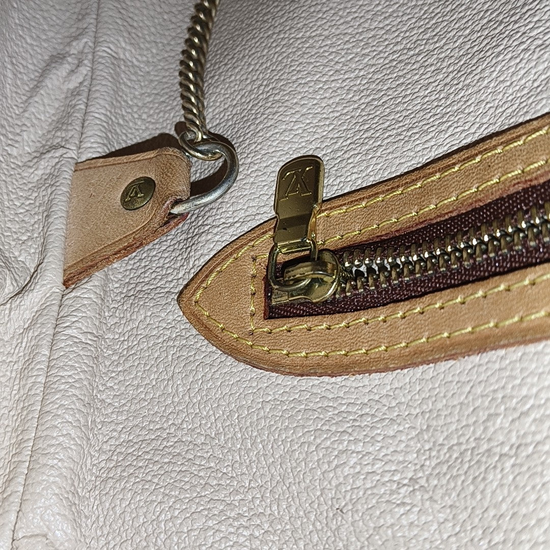 BUCKET PM Monogram Coated Canvas Brown