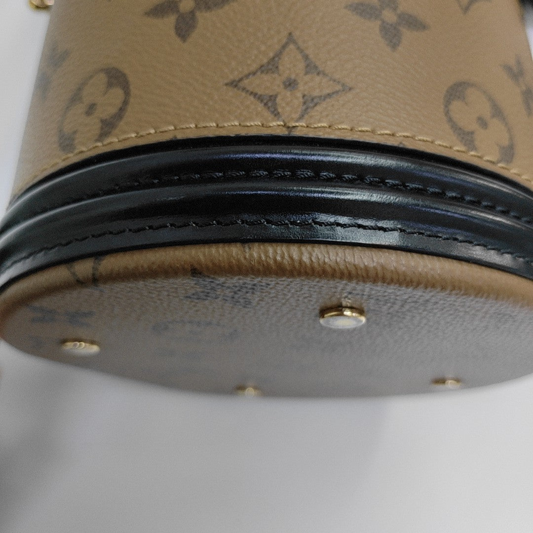 CANNES PM Monogram Coated Canvas Brown