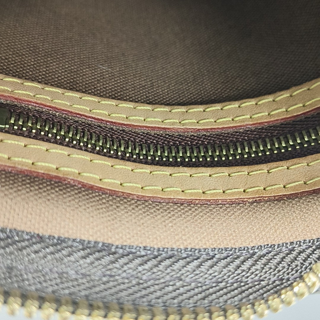 SPEEDY 25 Monogram Coated Canvas Brown