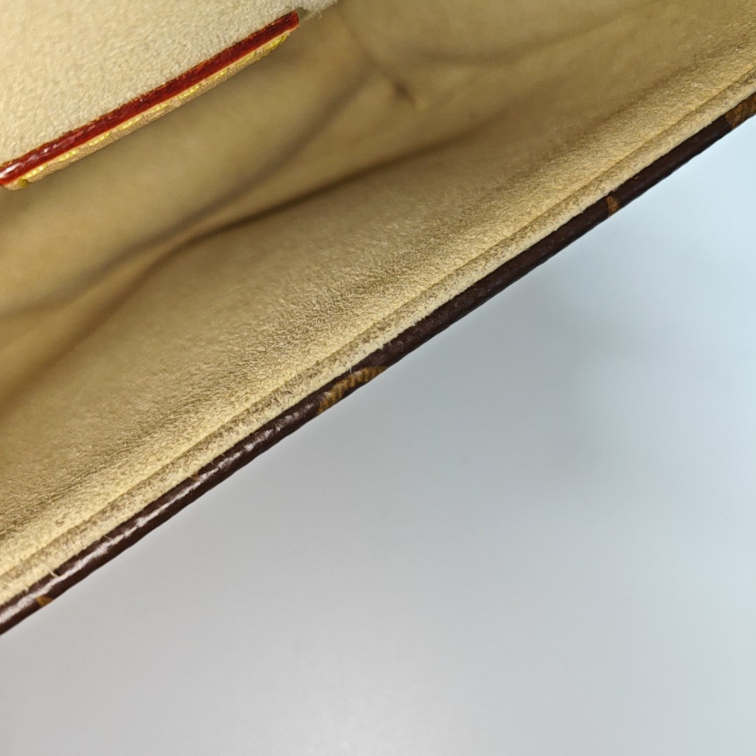SAUMUR BB Monogram Coated Canvas Brown